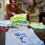 Michele Stuart Morgan, left, and Taelyn Coffee have created a grass-roots movement called "Juneau - Stop Heroin, Start Talking," bring awareness of heroin addiction in the capital city. The group has launched a public awareness campaign by handing out anti-heroin stickers, magnets and bracelets for free and selling T-shirts for a $10 donation.