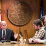 Gov. Bill Walker speaks to members of the media before signing the bill to buyout TransCanada's share of the AKLNG project at the Capitol on Thursday.