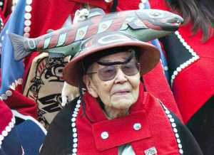 Dr. Walter Soboleff, center, wears his dog salmon hat during opening ceremonies of Celebration 2010.