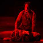 Sweeney Todd, played by Enrique Bravo, cries over the body of the beggar woman, played by Christina Apathy, during a rehearsal of Perseverance Theatre's musical production of "Sweeney Todd: the Demon Barber of Fleet Street."