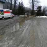 In heavy rain, water runs off the parking lot by CCTHITA and drains directly into Jordan Creek.