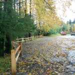 The split-rail cedar fence Juneau Watershed Partnership, Southeast Alaska Watershed Coalition, Central Council of Tlingit and Haida Indian Tribes of Alaska and volunteers have installed with the help of grants from the Department of Environmental Conservation, the US Fish and Wildlife Service and Wells Fargo.