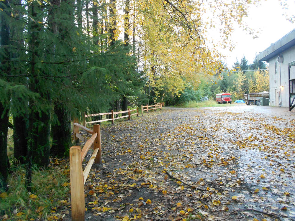 The split-rail cedar fence Juneau Watershed Partnership, Southeast Alaska Watershed Coalition, Central Council of Tlingit and Haida Indian Tribes of Alaska and volunteers have installed with the help of grants from the Department of Environmental Conservation, the US Fish and Wildlife Service and Wells Fargo.