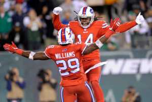 Buffalo Bills running back Karlos Williams, front, and wide receiver Sammy Watkins celebrate Williams' touchdown catch against the New York Jets during the second half of an NFL football game, Thursday, Nov. 12, 2015, in East Rutherford, N.J. (AP Photo/Bill Kostroun)
