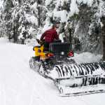 Scott Fischer of the Juneau Nordic Ski Club glooms the road at the Mendenhall Glacier Campground on Wedensday.