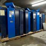 Two dozen parking vending machines sit in storage at the Downtown Transportation Center Parking Garage on Friday. The city is currently in litigation against Aparc over the system's failure.