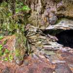 The Early Bird adit has been sealed off many times in the attempt to keep people out.  More recently a wire fence has been bolted to the outside.  With 202 feet of underground workings, it still calls to explorers.