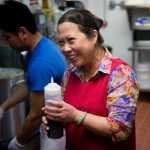 In this photo taken Oct. 9, owner Linda La, who says her various sauce recipes are key to her success, works in the kitchen of her recently opened Pho Vietnam Restaurant along Fireweed Lane in Anchorage.