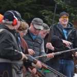 Eric Verrelli smiles after shooting in the Annie Oakley competition Saturday, Nov. 21, 2015 at the Juneau Gun Club's Turkey Shoot. Verrelli won the competition, winning a frozen turkey. The Gun Club, Juneau Shooting Sports Foundation, Juneau Archery Club and the Alaska Department of Fish and Game host the shooting competition each year as a fundraiser. Proceeds are divided by the three clubs, and any extra funds go to Helping Hands.
