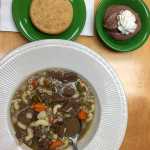 This Sept. 2 photo shows a bowl of musk ox stew served at a long-term senior care facility in Kotzebue.