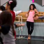 In this photo taken Nov. 3, Taylor Haines watches from the side of a studio as the Dance Contempo group rehearses a piece in Anchorage.