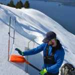 Mike Janes, avalanche forecaster at Alaska Electric Light and Power, assesses snow conditions above Snettisham.