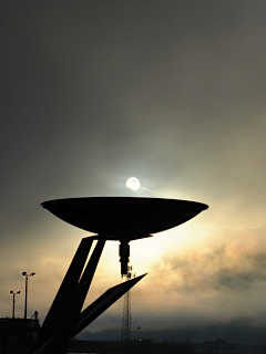 Sun above one of the rain catchers on the Juneau Seawalk Thursday morning.