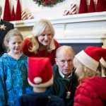 Gov. Bill Walker,his wife, Donna, and Lt. Gov. Byron Mallott, left, greet children from the Discovery Preschool at the Governor's Open House on Tuesday.