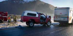 A truck slammed into the back of a Capital Transit bus on Egan Drive Friday morning after traffic was stopped for another two-vehicle accident on Egan Drive at Vanderbilt Hill Road.