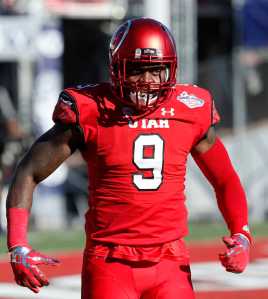 Utah defensive back Tevin Carter  celebrates after he made an interception to score against BYU during the Las Vegas Bowl Saturday.