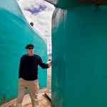 Artist Robert Murray walks through his sculpture 'Nimbus' in Juneau in June.