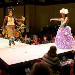 New Traditions, a two-part piece created by Sarah Cannard, Vicki Young, Cathy Anderson and Kay Haneline, and modeled by Cannard (right) and Adriane Honerbrink, is shown during the 2015 Wearable Art Show sponsored by the Juneau Arts & Humanities Council at Centennial Hall in February. The piece on the left, representing the East, was made from fabric and other materials salvaged from thrift stores, and the piece on the right, representing the West, was made from plastic bags.