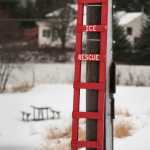 A wooden ice rescue ladder is kept at the edge of Twin Lakes on Tuesday. Warning signs posted at the edge of the lakes alert skaters that the ice is not monitored by the City and Borough of Juneau.