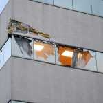 This Dec. 29 photo shows damage to the corner of The Brady Building after a small plane crashed into it in downtown Anchorage.