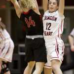 Juneau-Douglas' Abigail Watts, right, plays defense against Kenai's Alli Steinbeck during the Princess Cruises Alaska Airlines Capital City Classic at JDHS on Tuesday.