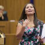 New citizens, 33 total, take an oath during the United States Citizenship and Immigration Services' Naturalization Ceremony at the Robert Boochever Courthouse at the Juneau Federal building on Aug. 21.