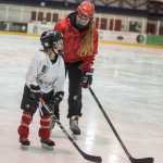 Juneau's Emma Kaelke works with Sydney Boline at a recent all-girls hockey session, organized for the second-straight year by her father, Mark. Emma, 16,  plays in New Hampshire for the Northern Cyclones of the New England Women's Junior Hockey League.