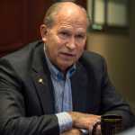Alaska Gov. Bill Walker speaks in an interview at the Juneau Empire on Dec. 23, 2015.