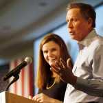 Republican presidential candidate, Ohio Gov. John Kasich, accompanied by Jessica Nickel, speaks during a stop at an Addiction Policy Forum on Jan. 5 in Hooksett, New Hampshire.