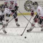 The Juneau-Douglas Crimson Bears hockey team came out of their two week winter hibernation with a 7 to 4 victory over the Bartlett Golden Bears on Friday night at the Treadwell Arena.