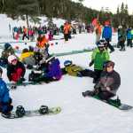 Students of all ages gather to participate in the the World's Largest Lesson at Eaglecrest on Friday as part of Learn to Ski and Snowboard Month. The event, that included 80 participants and 17 instructors, was part of a national attempt to break a Guinness World Record.