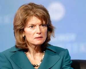 FILE - In this March 3, 2014 file photo, Sen. Lisa Murkowski, R-Alaska speaks in Houston. The committee has voted to approve Dr. Robert Califf to be commissioner of the Food and Drug Administration, but the nomination may face trouble on the Senate floor. Murkowski said she will hold up the nomination until she has reassurances from FDA that genetically modified salmon will be labeled as such. (AP Photo/Pat Sullivan, File)