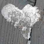 Remnants of ice on the downtown sea walk resemble a heart.