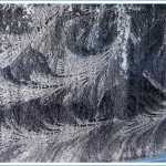 Feathery window designs on a cold winter day.