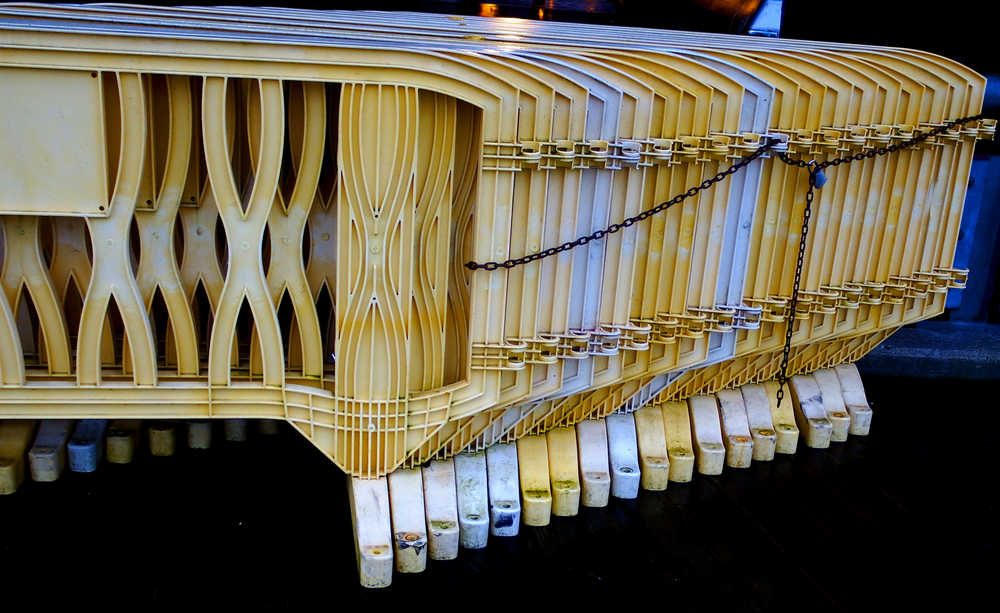 Stored guard rails on the cruise ship docks await tourist season.