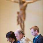 Gov. Bill Walker and First Lady Donna Walker bow in prayer during the Dr. Martin Luther King Jr. 2016 Community Celebration at the St. Paul's Catholic Church on Monday.