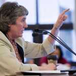 Pat Pitney, director of the Office of Management and Budget, presents Gov. Bill Walker's budget proposal to Senate Finance Committee members at the Capitol on Wednesday.