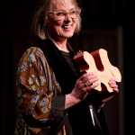 Nancy DeCherney displays her Arts Advocacy award during the 2016 Governor's Awards for the Arts & Hunanities held at the Juneau Arts & Culture Center in Juneau on Jan. 28, 2016.