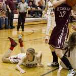 JDHS Kallen Hoover is down while trying her best to keep the ball.