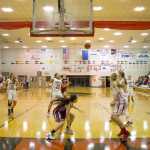 The Crimson Bears' Tona Fogg knows she is in the perfect spot to catch the ball and make a basket.