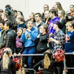 The Crimson Cheerleaders get the crowd pumped for the game Friday night against Ketchikan.