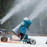 Dustin Sluder of the Eaglecrest Ski Area checks on snowmaking equipment near the base of the Ptarmigan Chairlift on Monday. The air temperature of 29 degrees just barely allowed for snowmaking.