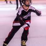 Luke Bovitz eyes one of final turns in the Second Annual Skate-a-Thon sponsored by JDIA's Squirt Division. Bovitz completed 120 laps, almost 10 miles.
