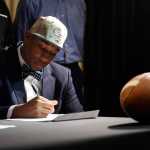 Rashad Byrd signs his letter of intent to Georgia Southern during national signing day Wednesday at North Augusta High School in North Augusta, South Carolina.