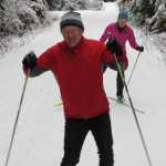 Don and Chris Thomas ski the freshly groomed Montana Creek Trail.