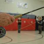 Raincountry Flyfishers president Tony Soltys demonstrates a flyfishing grip at a March 2014 class.