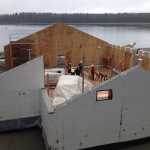 Contractors put the walls of the tribal house up in summer/fall of 2015. They will ultimately be cladded outside and in with hand-adzed cedar planking.