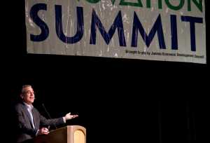 Dr. Michael Shuman delivers his keynote speech during the Juneau Economic Development Council's Innovation Summit at Centennial Hall on Monday. Shuman, an economist, attorney, author and entrepreneur, is considered a globally-recognized expert of community economics.