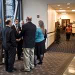 House minority members huddle outside of the House of Representatives chambers at the Capitol on Monday after a surprise measure, House Concurrent Resolution 23, that would suspend some legislative rules that govern committee meetings.