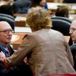 Rep. Gabrielle LeDoux, R-Anchorage, speaks with House Finance Co-Chairs Rep. Steve Thompson, R-Fairbanks, left, and Rep. Mark Neuman, R-Big Lake, in the House of Representatives on Monday as they discuss changing their governing rules to focus on the budget crisis.